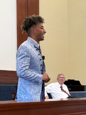 Batchelor addresses youth at devotional at Mountain View Stake Center in Nairobi, Kenya on 13 November 2025.