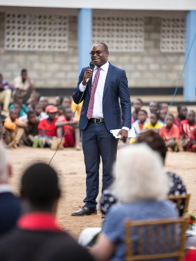 District-President-for-the-Church-of-Jesus-Christ-of-Latter-day-Saints,-Leinhard-Amos-speaks-to-the-group.--Chimbwi,-Malawi.--October-2022