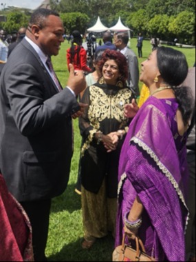 Elder-Thierry-K.-Mutombo-talking-to-the-Hindu-Council-of-religion-Chairperson-Sujata-Kotamraju-during-the-Kenyan-National-Prayer-Breakfast-held-in-Safari-Park-Hotel-Nairobi-on-28-May-2025.-