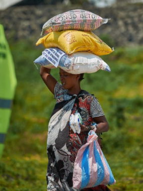 SOH-Woman-with-3-bags-on-head.PNG