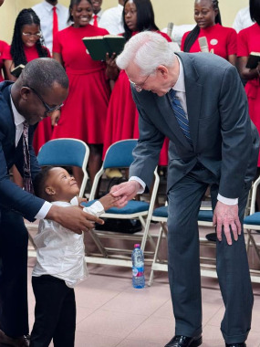 Elder Christofferson greets Dale Nyameadom Ampomah Owusu-Fenyi