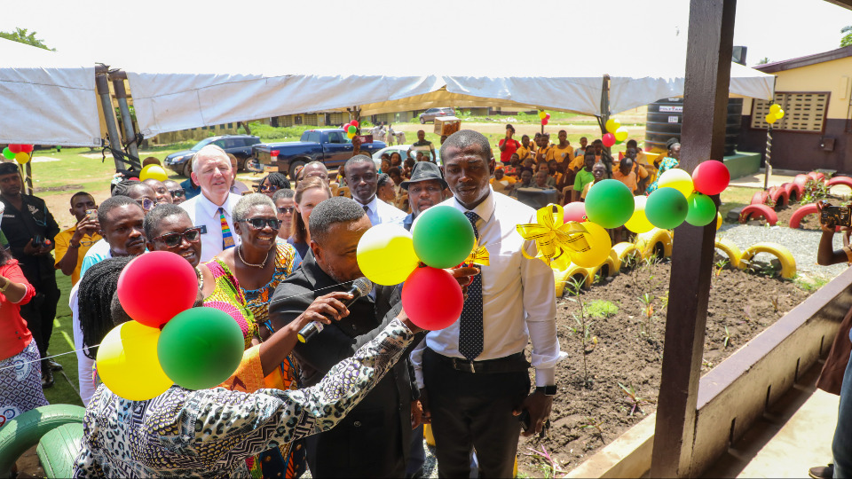 School administrators and Church officials cut the ribbon handing over the renovated classrooms on 5 June, 2025.