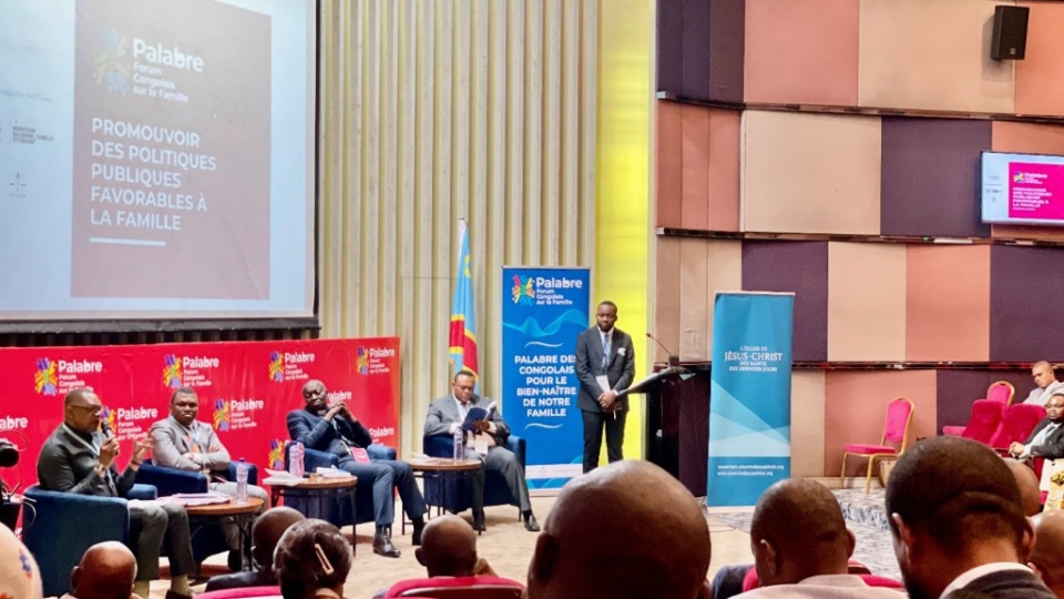 Sitting from left to right, facing the participants, are: The Honorable Senator José Mpanda Kabangu, Boris Kabeya, Manager of FamilySearch International for Central Africa; Reverend Armand Kinyamba, Secretary General of the CNRP; and Elder Thierry K. Mutombo, President of the Africa Central Area. They participated in the Congolese Forum on the Family held in Kinshasa, Democratic Republic of Congo.
