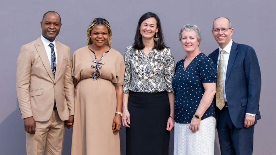 From-Left-Elder-and-Sister-Onene,-Sister-Yee,-Sister,-and-Elder-Giraud-Carrier-pose-for-a-photo-at-the-end-of-the-YSA-Devotional-held-in-Nkomo-Branch-on-February-15,-2025,-in-Yaounde,-Cameroon.