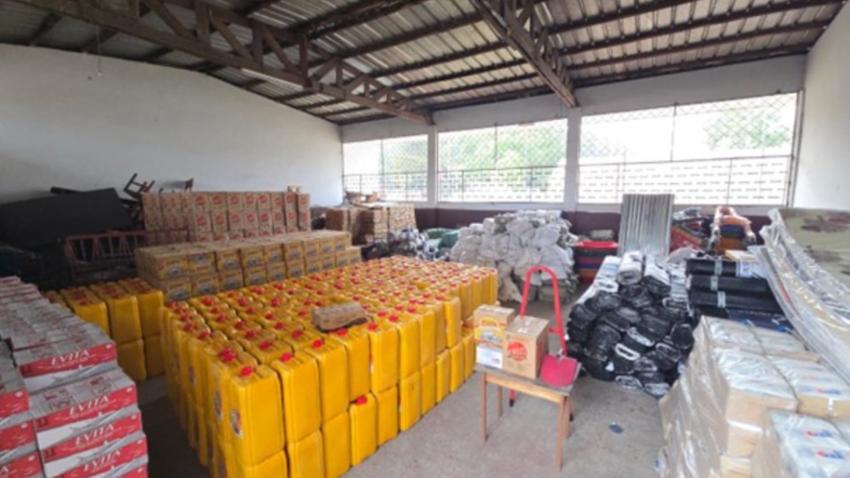 Photo of food and non-food supplies in a warehouse at the symbolic handover ceremony of the Church’s donation to the flood disaster victims in Brazzaville.