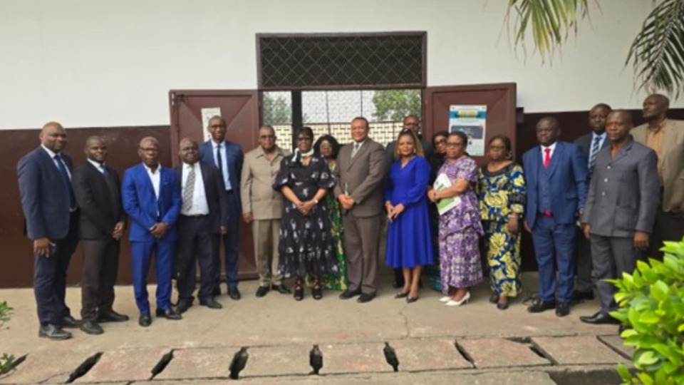 Group-photo-in-front-of-one-of-the-warehouses-storing-food-and-non-food-supplies-at-the-symbolic-handover-ceremony-of-the-Churchs-donation-to-the-flood-disaster-victims-in-Brazzaville,-August-22,-2025