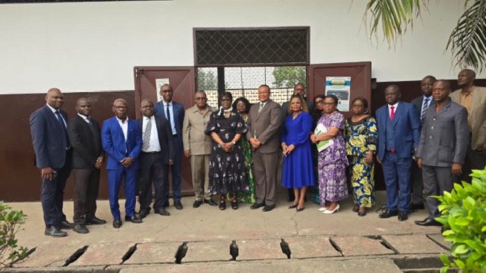 Group photo in front of one of the warehouses storing food and non-food supplies at the symbolic handover ceremony of the Church’s donation to the flood disaster victims in Brazzaville, August 22, 2025.