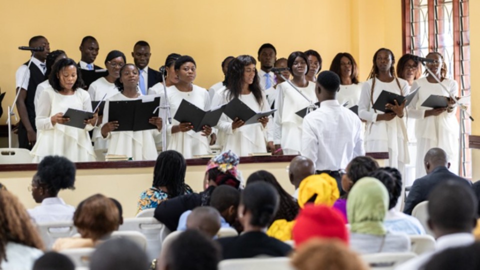 Dressed in white robes, the choir filled the room with song during the first Stake Conference in Yaoundé, Cameroon, on 1 June 2025