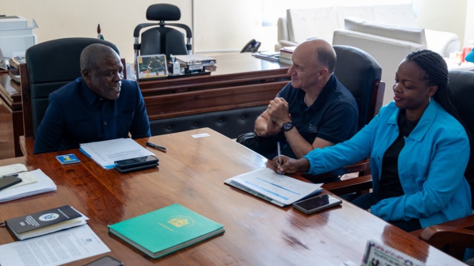 From Left Dr. Frank George Haule Hawassi (Administrative Secretary of Songwe Province), Elder Pieper (Africa Central Area Presidency) and Ophilia Karumuna (Chief Mbeya Field Office, UNICEF) discussing the visit in Songwe, Tanzania on August 26th, 2025