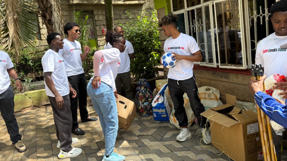 YSA assist Batchlor and Corey in unpacking supplies for children at Riuru Children's Home. 15 November 2025