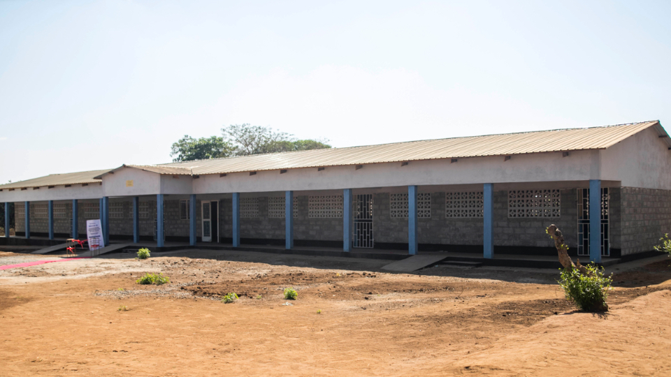 Four-of-the-eight-classrooms-can-be-found-in-this-part-of-the-new-school.--Its-the-biggest-and-most-beautiful-building-in-the-village-of-Chimbwi,-Malawi.-October-2022----