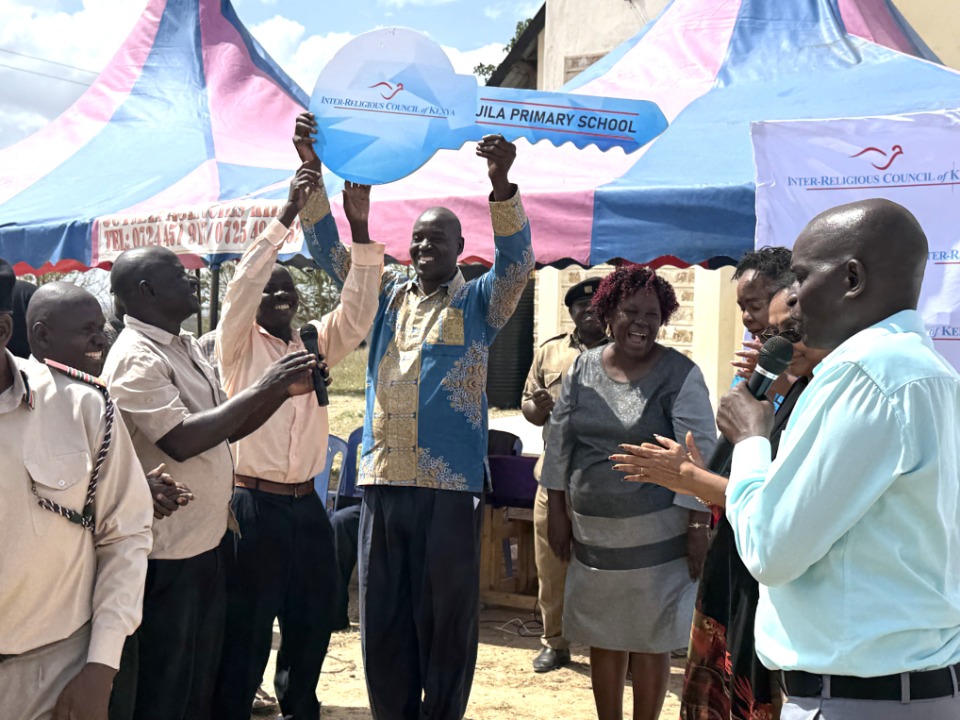 Mr. Samson Kahindi, Principal of Jila Primary School, celebrates at handover ceremony.  Kilifi County, Kenya, September 23, 2025