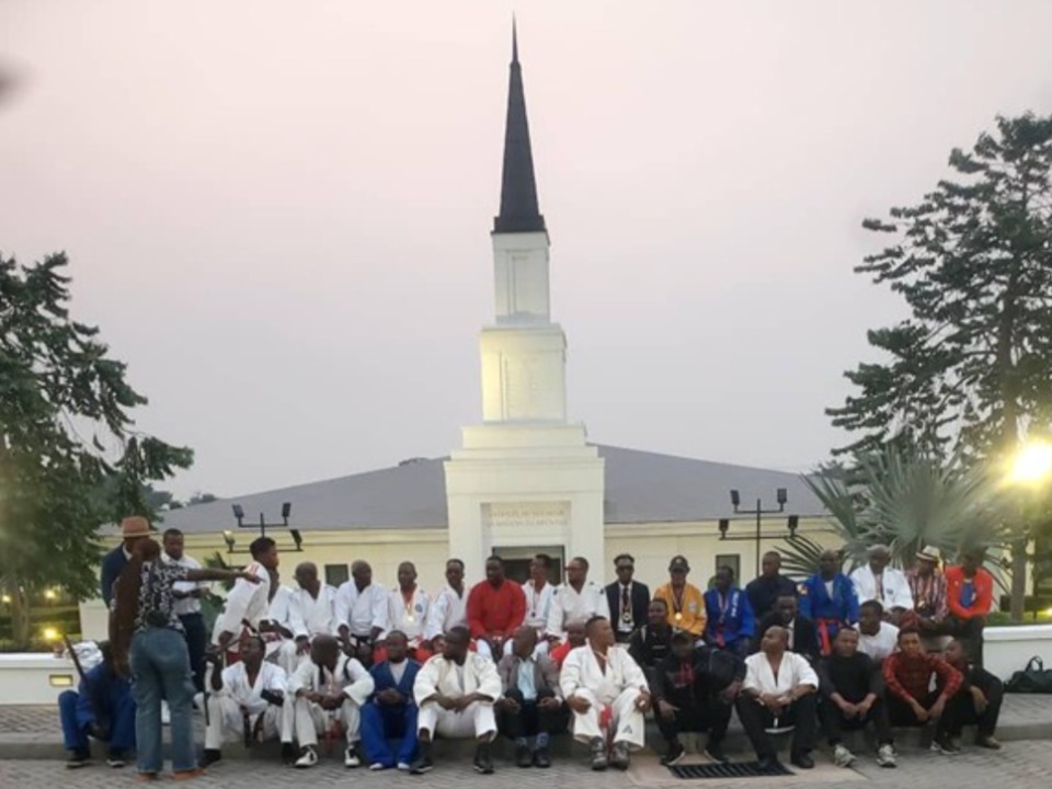 Photo of athletes in front of the Kinshasa Temple during a Word of Wisdom conference at the Kinshasa Stake Center, DRC. 12 July 2025