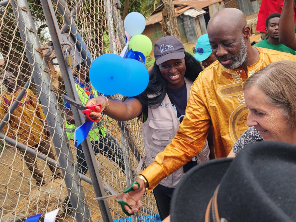 Honorable Sekou Kanneh, District Lawmaker, cuts the ribbon formalizing the hand over on 2 May, 2025.