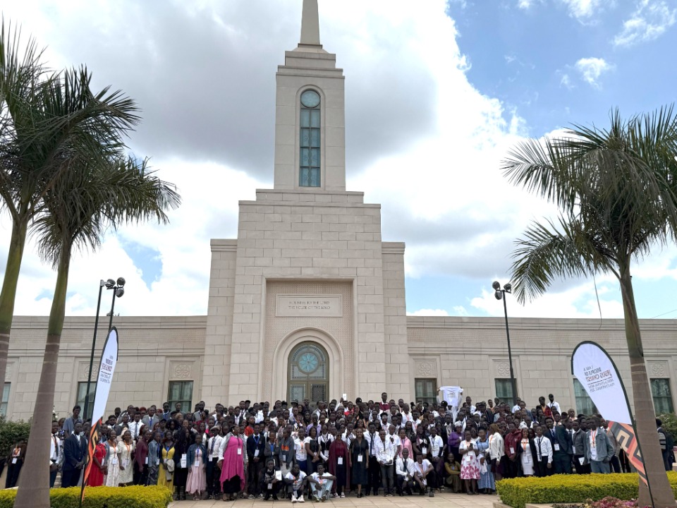 Group Poses for photo outside of Nairobi, Kenya Temple on the 1st day of the YSA conference. August 28, 2025
